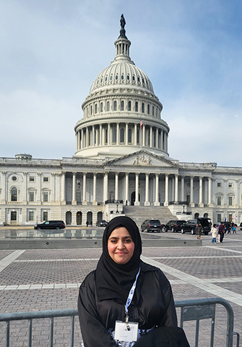 Baydaa standing in front of the US Capitol Building