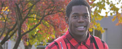 Smiling man outdoors in the fall